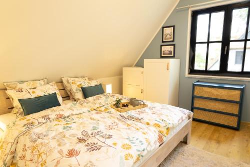 Cama ou camas em um quarto em Neues Friesenhaus Oogenstern Ferienhaus Usedom -stufenlos im Erdgeschoß- ruhige Lage