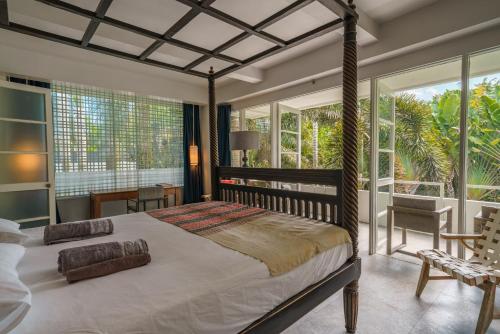 Krevet ili kreveti u jedinici u objektu Villa Nunasari - 3BR Villa w/ Lush Greeneries, Close to the Beach!