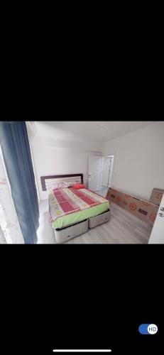 a bedroom with two beds in a room at Daire 2+1 in Dalaman