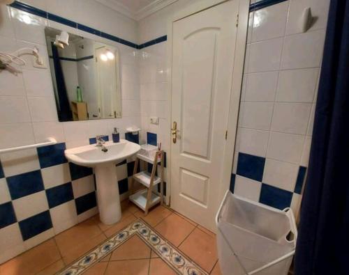 a bathroom with a sink and a shower at La Tejita in La Tejita