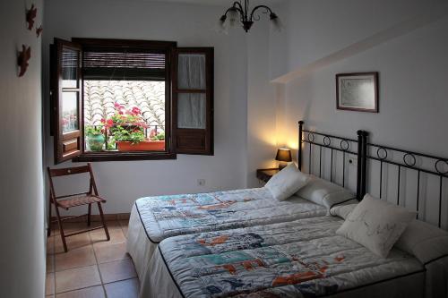 Posteľ alebo postele v izbe v ubytovaní Casa Rural Azahar