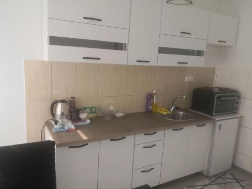 Una cocina o cocineta en Apartman Nea