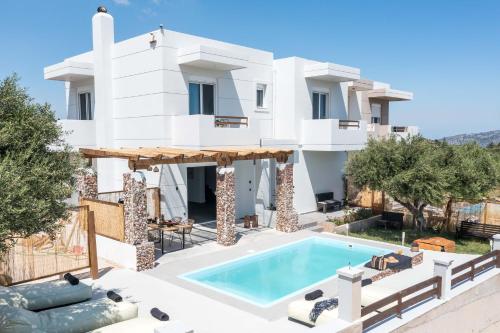 an image of a villa with a swimming pool at Villa Tranquila Rhodes in Psinthos