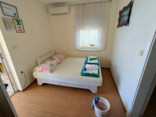 מיטה או מיטות בחדר ב-Apartment Gebic Ivan