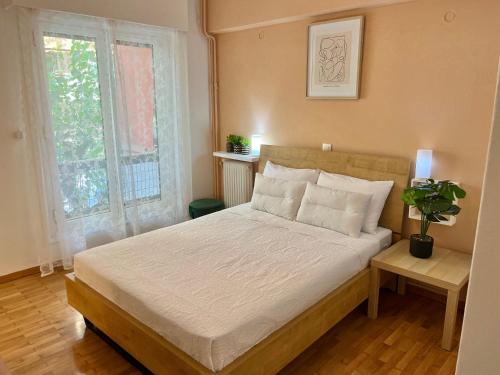 Katil atau katil-katil dalam bilik di New City Apartment Neos Kosmos