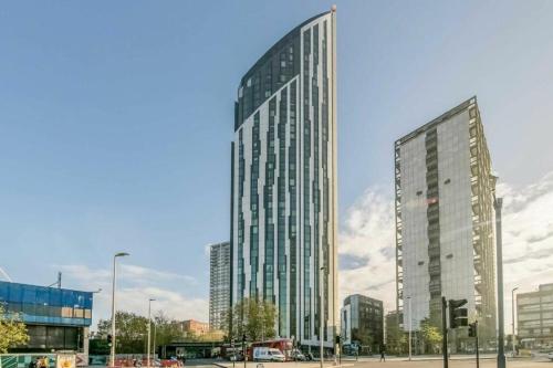 two tall glass buildings in a city at Entire Studio Apartment in Central London SE1 in London