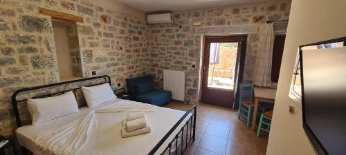 Postel nebo postele na pokoji v ubytování Althea Village