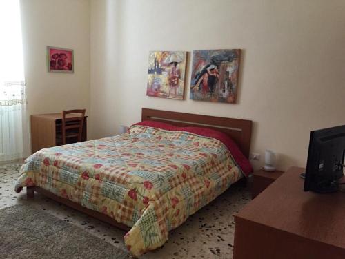 Giường trong phòng chung tại Casa vacanze Il Principe