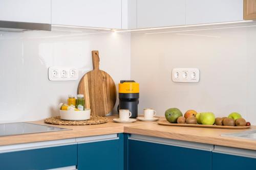a kitchen with a counter with fruit on it at Mar-Gi 25 in Aiándion