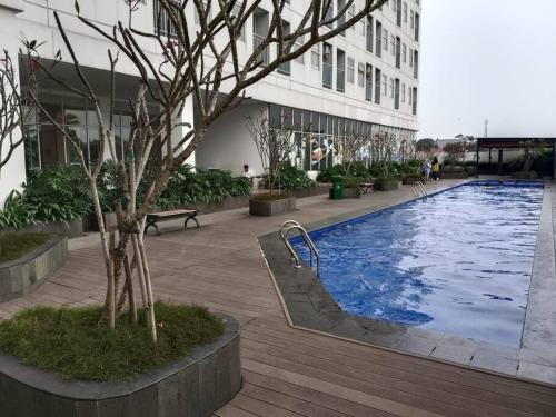 Swimmingpoolen hos eller tæt på MRT Convenience Cozy Serpong Garden Studio