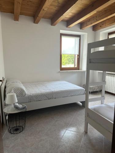 Postel nebo postele na pokoji v ubytování Casa Matilde - Residence Cà Vecchia