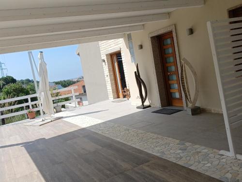 a view from the front porch of a house at ArteMare B&B in Diamante