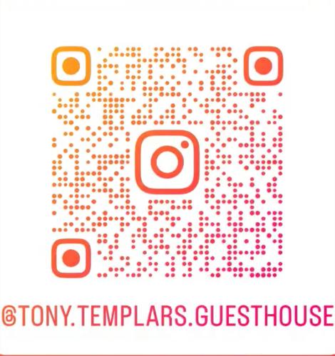 a close up of a sign that reads tyson templars gutarians questionnaire at Tony Guesthouse in ‘Akko