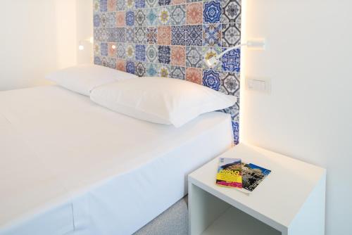 Letto o letti in una camera di La Dimora del Maestro