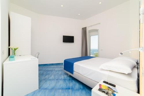 Letto o letti in una camera di La Dimora del Maestro
