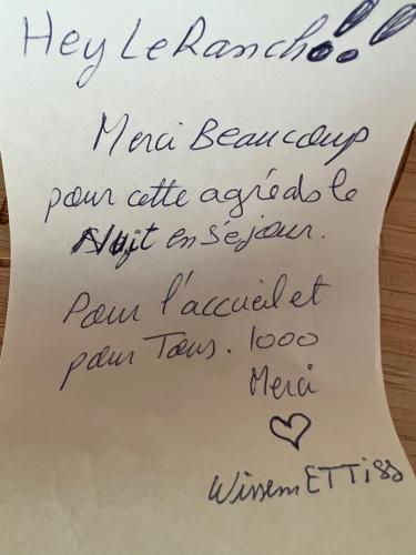 a piece of paper with handwriting on it at Hotel Le Ranch in Brûlon