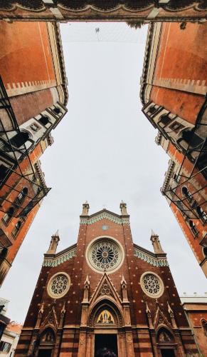 a large church with a clock tower at Hotel Gritti Pera & Spa in Istanbul
