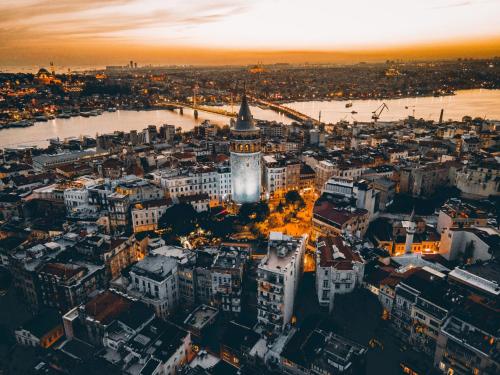 an aerial view of a city at sunset at Hotel Gritti Pera & Spa in Istanbul