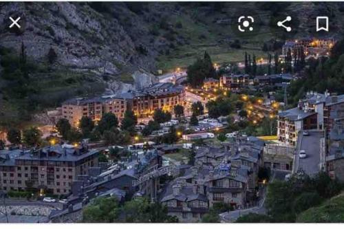 a view of a city at night with lights at APARTAMENTO CANILLO Wifi-Parquing free-Terraza HUT 5213 in Canillo