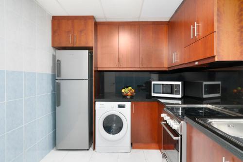  Golden Sands Hotel & Residences -  Room  picture :   Tea/Coffee maker    Internet facilities    Minibar                           