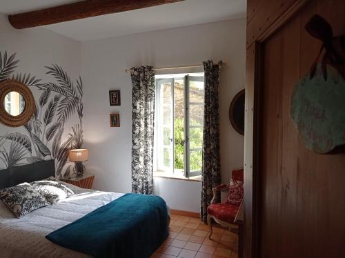 Katil atau katil-katil dalam bilik di La Bastide de Boisset