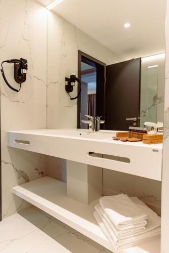 Ванная комната в Hotel Alexandrion Experience