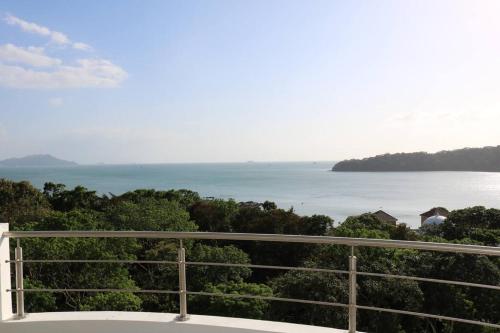a view of the ocean from a balcony at 07F Resort Breathtaking Ocean Views Panama Canal in ArraijÃ¡n