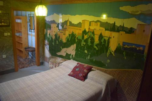 A bed or beds in a room at Castillo Esmeralda
