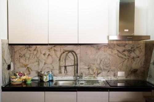 Dapur atau dapur kecil di Fiorino Apartment - Piazza della Libertà