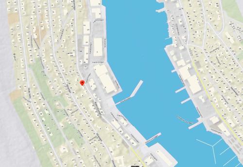 a floor plan of a building with a red dot at BRAND NEW FLAT IN CENTRAL KLAKSVÍK in Klaksvík