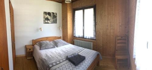Postel nebo postele na pokoji v ubytování Le clair logis
