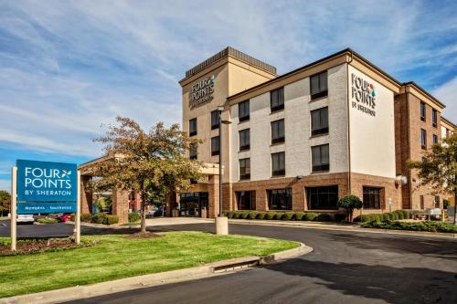 a rendering of the front of a hotel at Four Points Memphis Southwind in Memphis