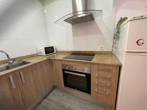 A kitchen or kitchenette at Apartamento Forn Vell