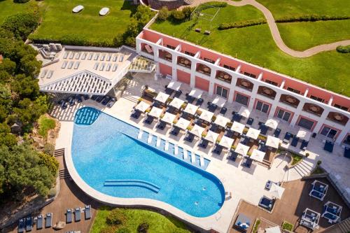 an aerial view of a hotel with a swimming pool at Penha Longa Resort in Sintra