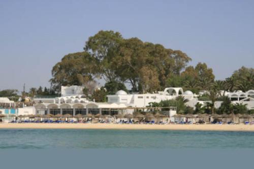 a view of a beach with a resort at The Sindbad in Hammamet