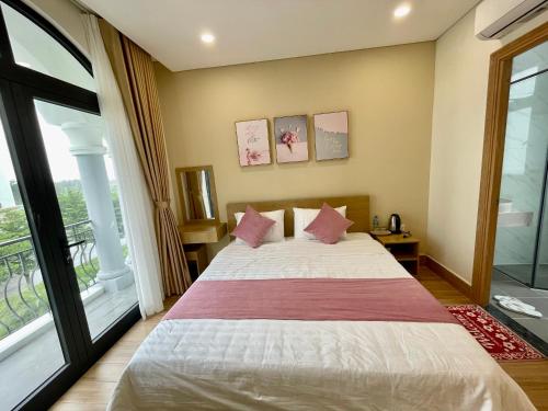 Кровать или кровати в номере Teddy 108 Homestay & Cafe - 3 stars - Grand World Phu Quoc