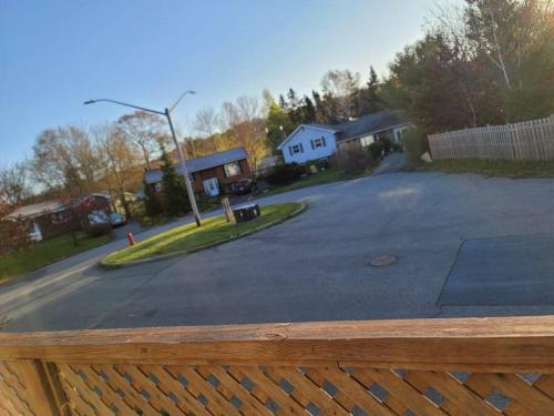 a view of a residential street from a wooden fence at Serene in Halifax