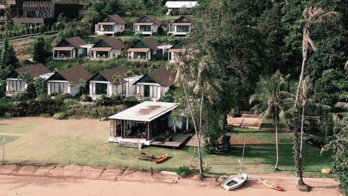an aerial view of a house on the beach at Little Moon Villa in Ko Mak