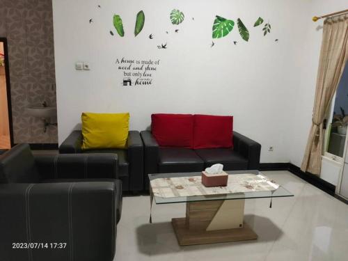 Un lugar para sentarse en Homestay Sidoarjo - Comfort