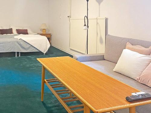 Giường trong phòng chung tại Holiday home SÖLVESBORG X