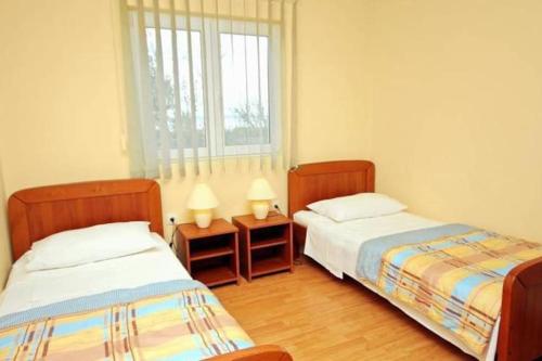 Postel nebo postele na pokoji v ubytování Villa Mateja, Beachfront House