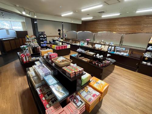 an overhead view of a store with a counter sidx sidx at Sapporo's Secret Onsen Sanctuary Marukoma Onsen Ryokan in Chitose