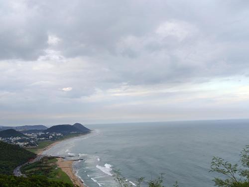 a view of the ocean from a hill at Jazzy Beach Guest House in Visakhapatnam