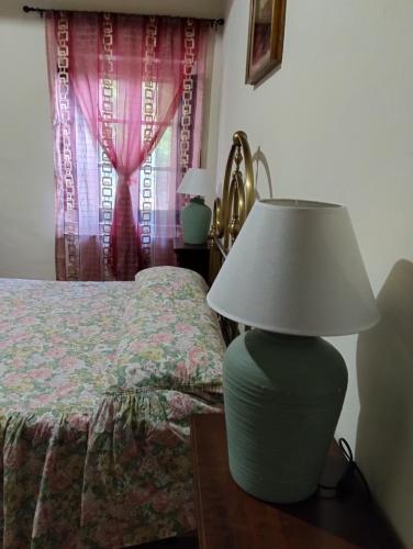 Ένα ή περισσότερα κρεβάτια σε δωμάτιο στο ROSMARINO CASALE