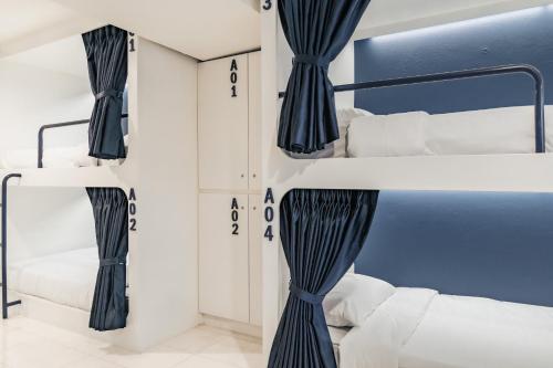 Letto o letti in una camera di Shapel Hostel and Cafe