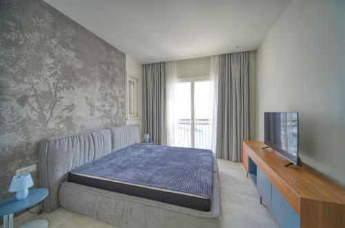 Ліжко або ліжка в номері Lustica Bay Apartment Iva By 2bhome
