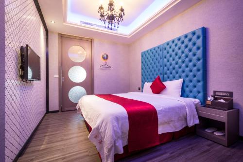 Postel nebo postele na pokoji v ubytování Jin Spa Resort Hotel
