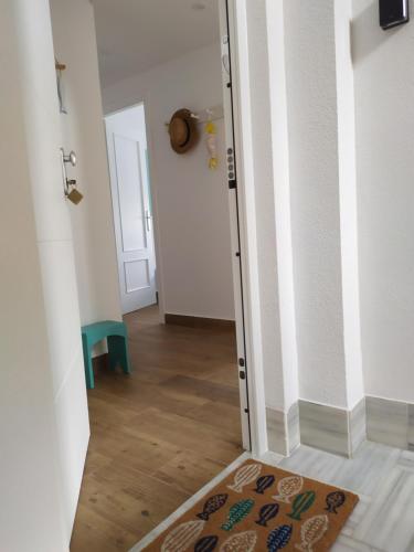 Łóżko lub łóżka w pokoju w obiekcie CABALLITO DE MAR