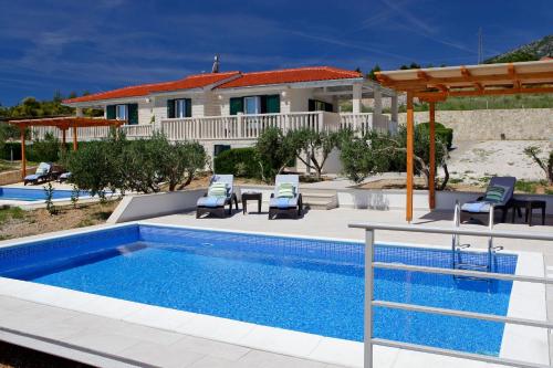 Foto Holiday Homes Oliva 6