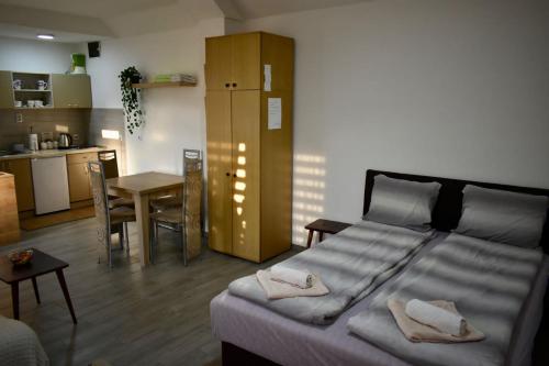Postel nebo postele na pokoji v ubytování Petković apartman
